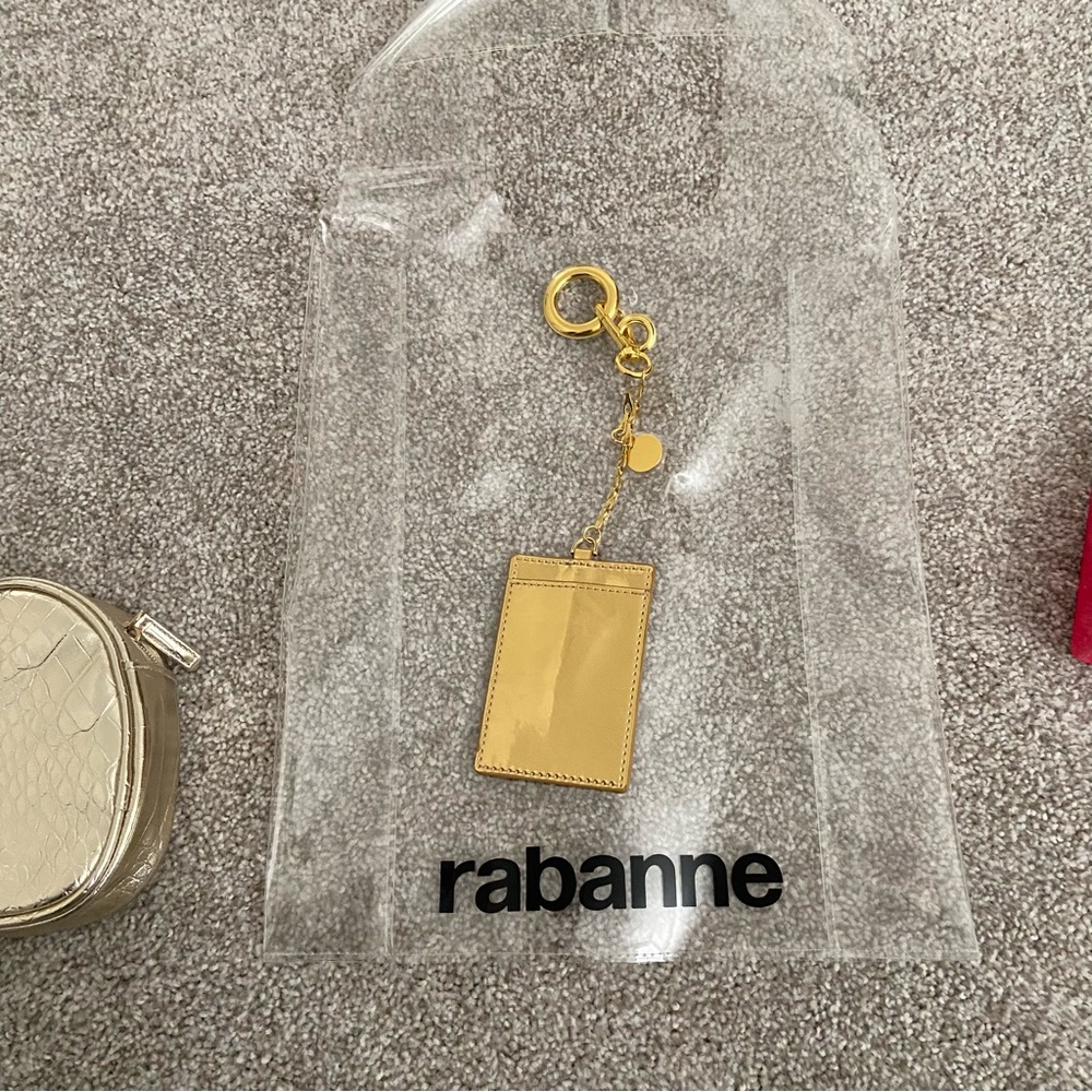 5 items - Rabanne Transparent Tote with Gold Heart Pouch, lotion and more! ⭐️ - Picture 5 of 12